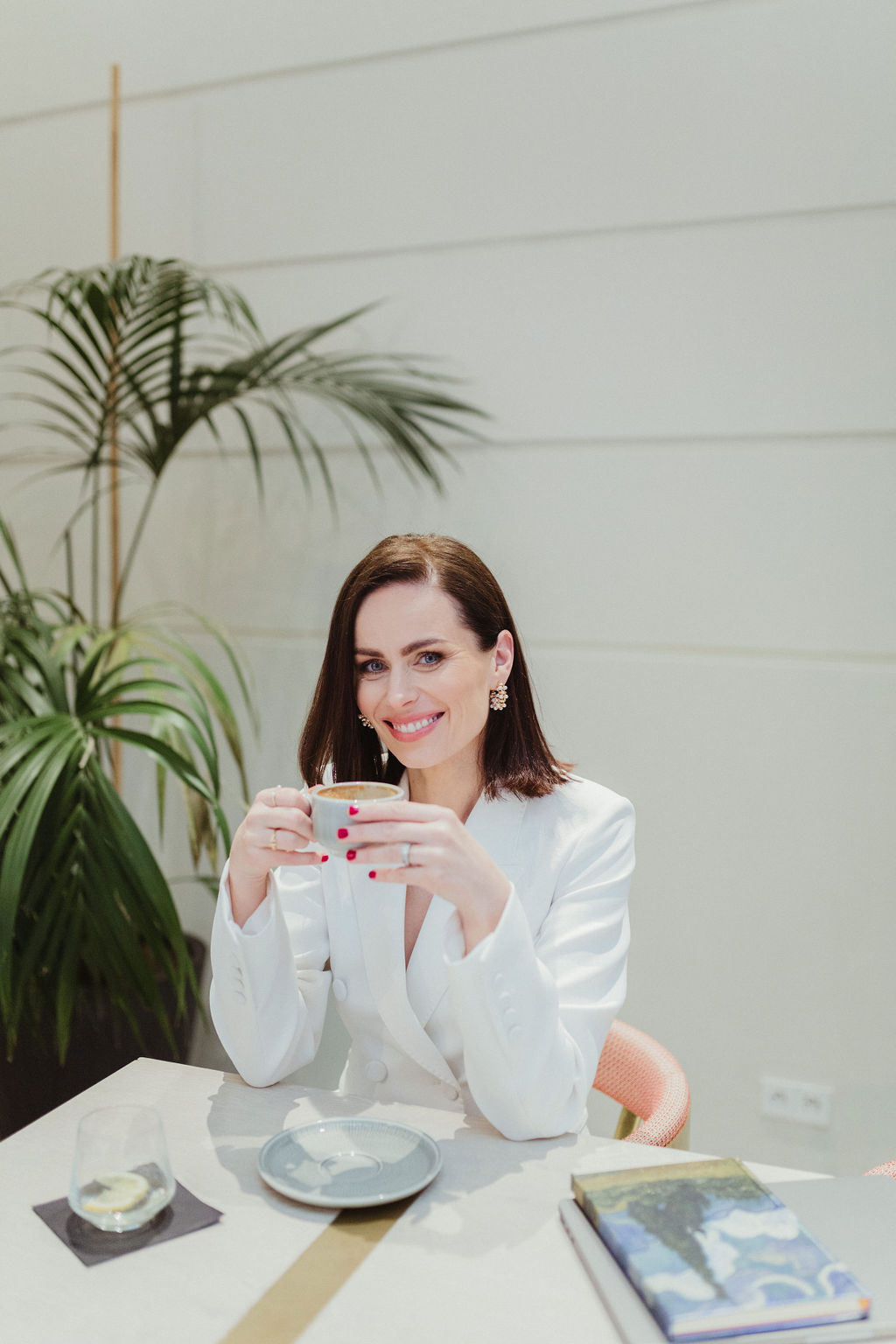 Kristýna Kleslová with a coffee, Prague wedding planner